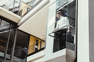 Man Inside a Glass Elevator